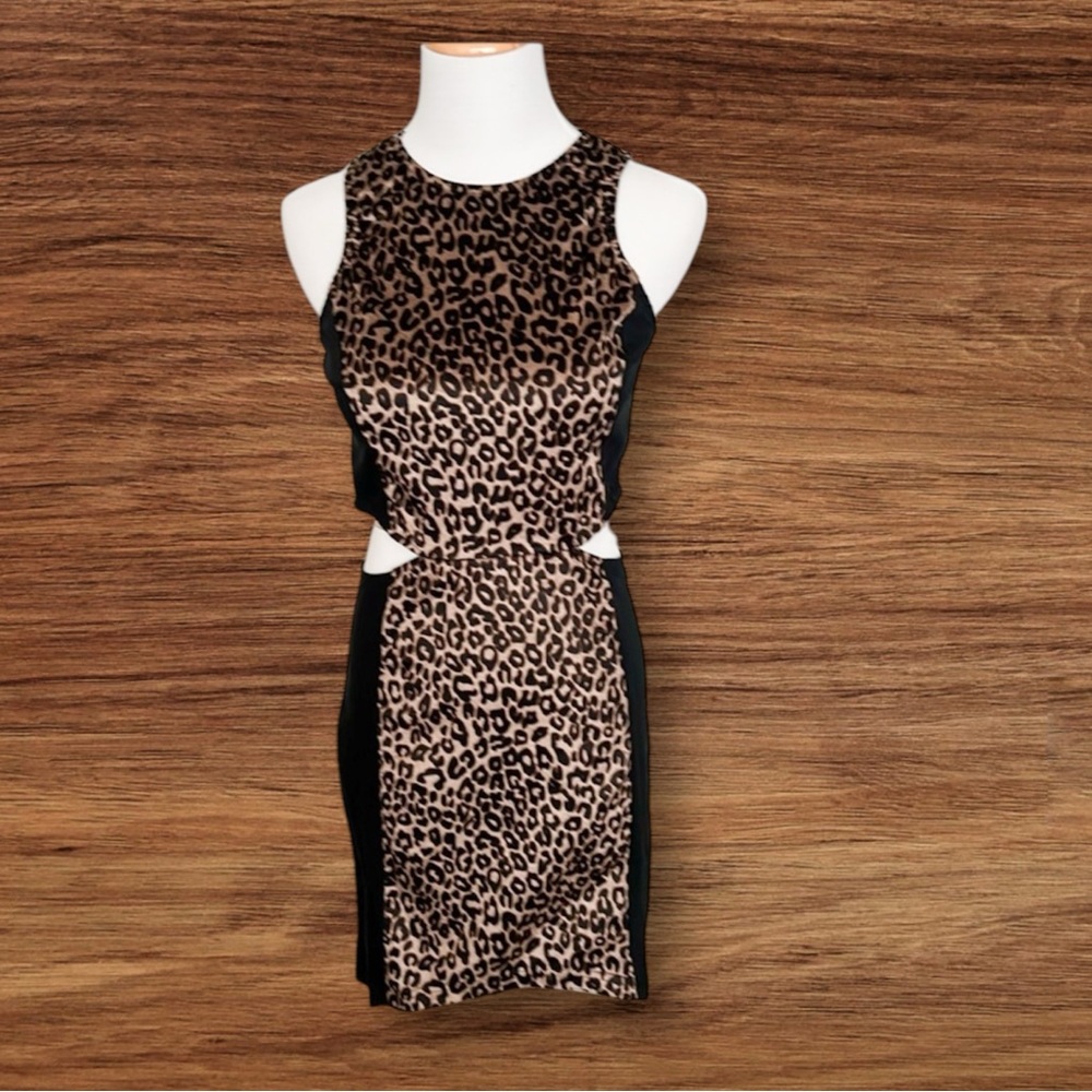 Leopard print cut out mini dress. Size large